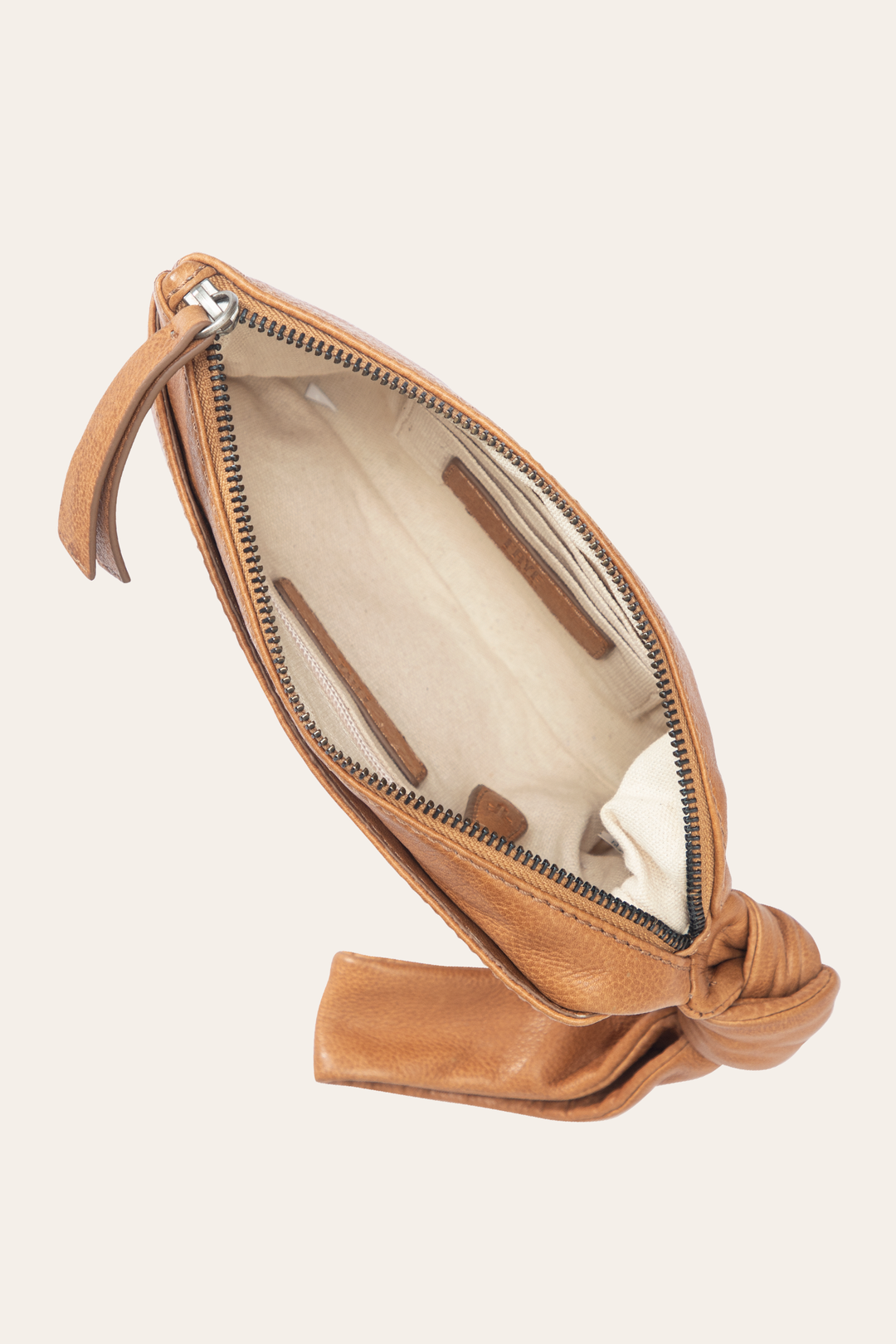 Nora Beige Knotted Wristlet | Frye Trending